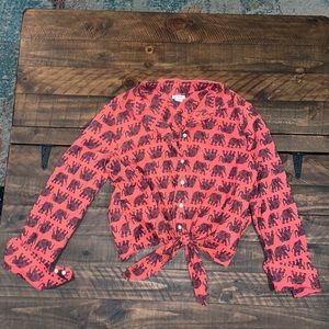 Blouse with tie front.